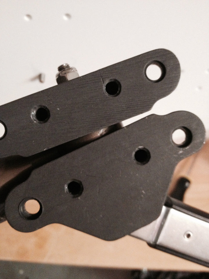Top view of Docktail Bar Magma LeveLock all-angle adjustable fish rod holder mount, showing its secure clamp and mounting mechanism.