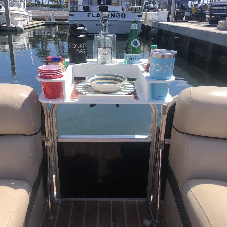 Docktail Butler boat table with pontoon rail mount, featuring a compact design and sturdy construction for marine use.