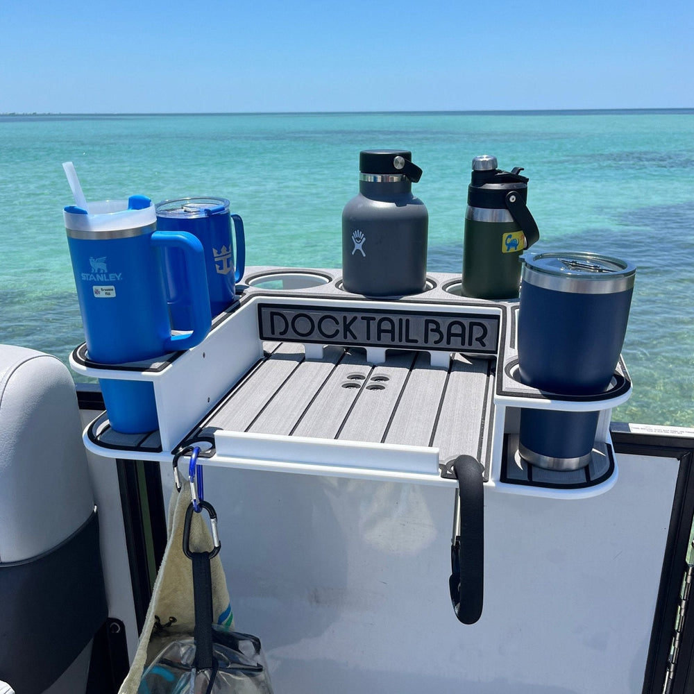 Docktail Butler boat table with pontoon rail mount, shown attached to a pontoon boat rail with drink holders and sturdy mounting hardware.