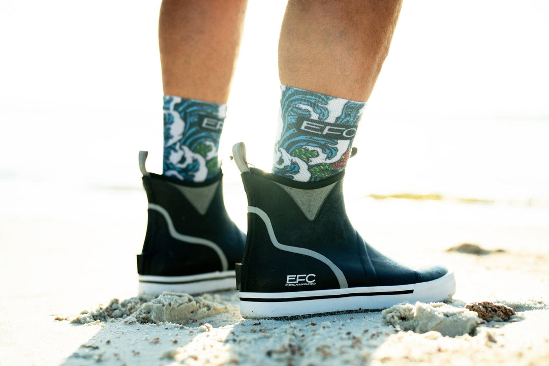 Black LFG Deck Boots by Everglades Fishing Co, featuring durable waterproof footwear with rugged soles and secure lacing.