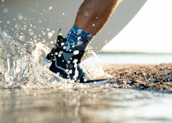 Black LFG Deck Boots by Everglades Fishing Co, waterproof shoes with sturdy soles and ankle-high design for fishing or outdoor activities.