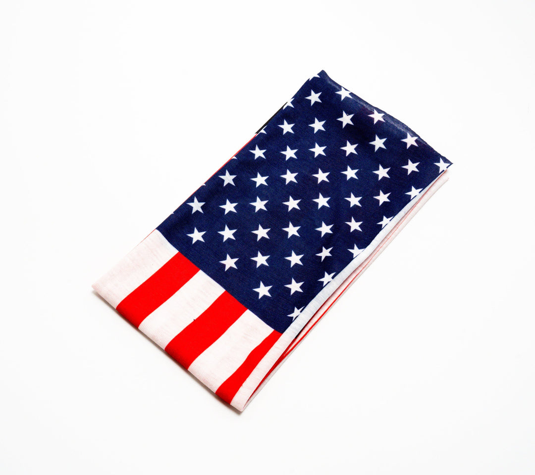 Everglades Fishing Co American Flag Buff worn as a headband or neck gaiter with red, white, and blue flag pattern.