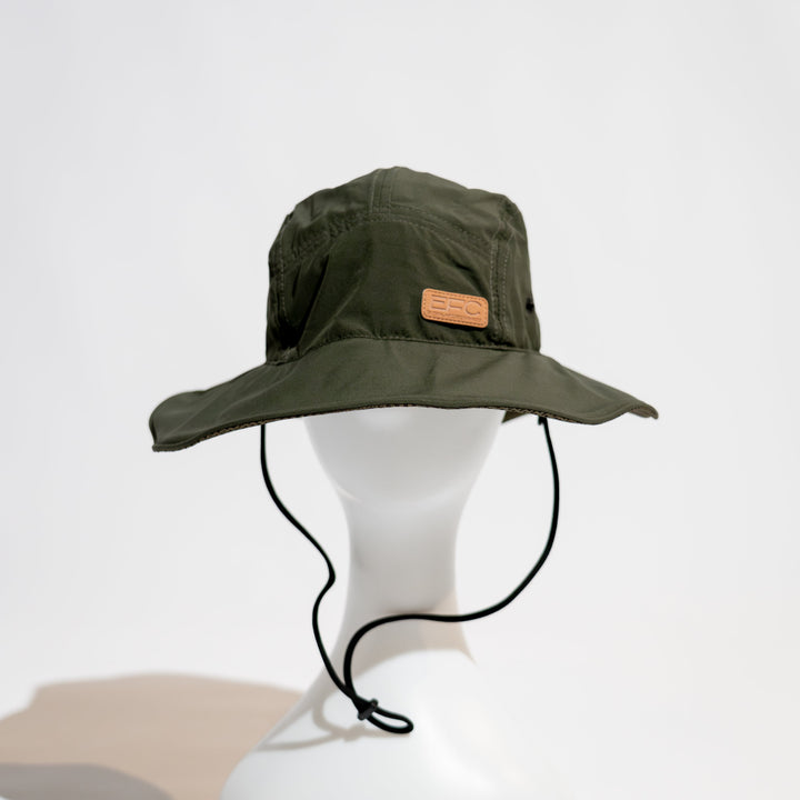 Army green bucket hat by Everglades Fishing Co, featuring a wide brim and casual outdoor style.