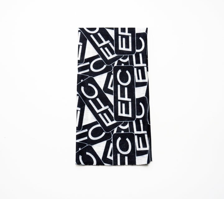 Bright orange EFC Buff by Everglades Fishing Co, made of stretchy fabric, shown laid flat on a white background.