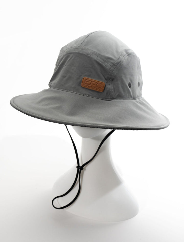 Gray bucket hat from Everglades Fishing Co with a wide brim and water-resistant material, suitable for outdoor and fishing activities.