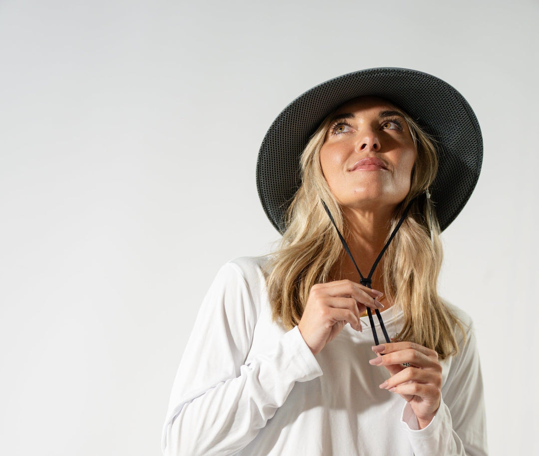 Gray bucket hat from Everglades Fishing Co with wide brim and casual outdoor style, perfect for sun protection.