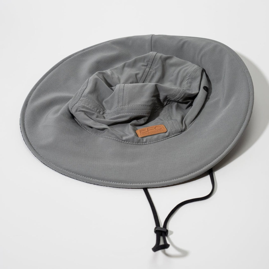 Gray bucket hat by Everglades Fishing Co with wide brim and adjustable drawstring, suitable for outdoor activities.