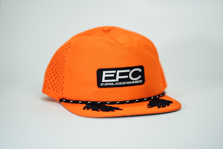 Man wearing a black Everglades Fishing Co. Late Night Snapback cap, showing the adjustable back and embroidered logo.