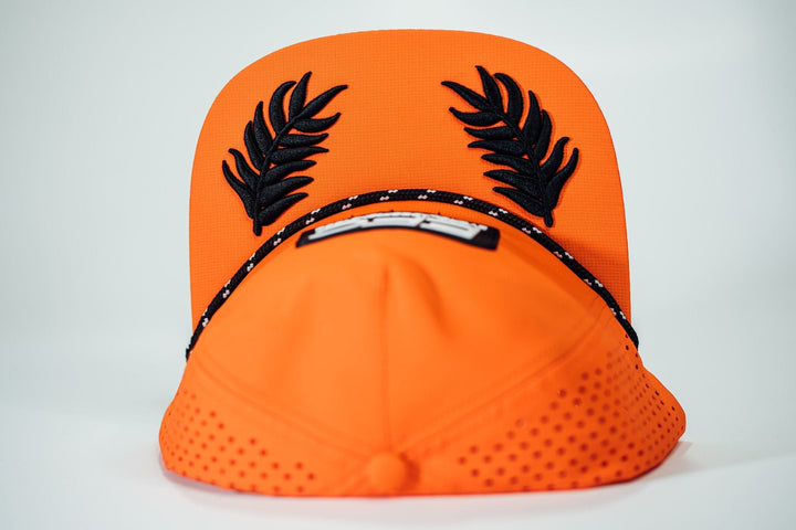 Man wearing a black Everglades Fishing Co late night snapback hat with a flat brim and embroidered logo.