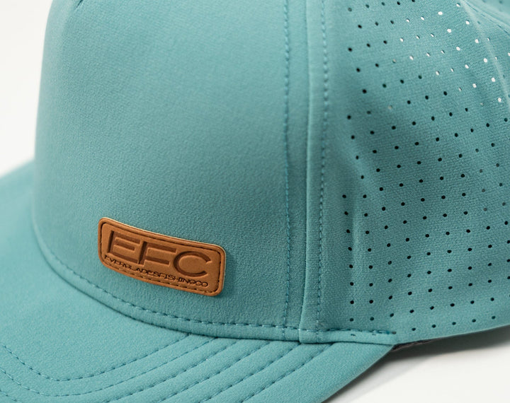 Teal picnic snapback hat by Everglades Fishing Co with adjustable strap and embroidered logo, front view.