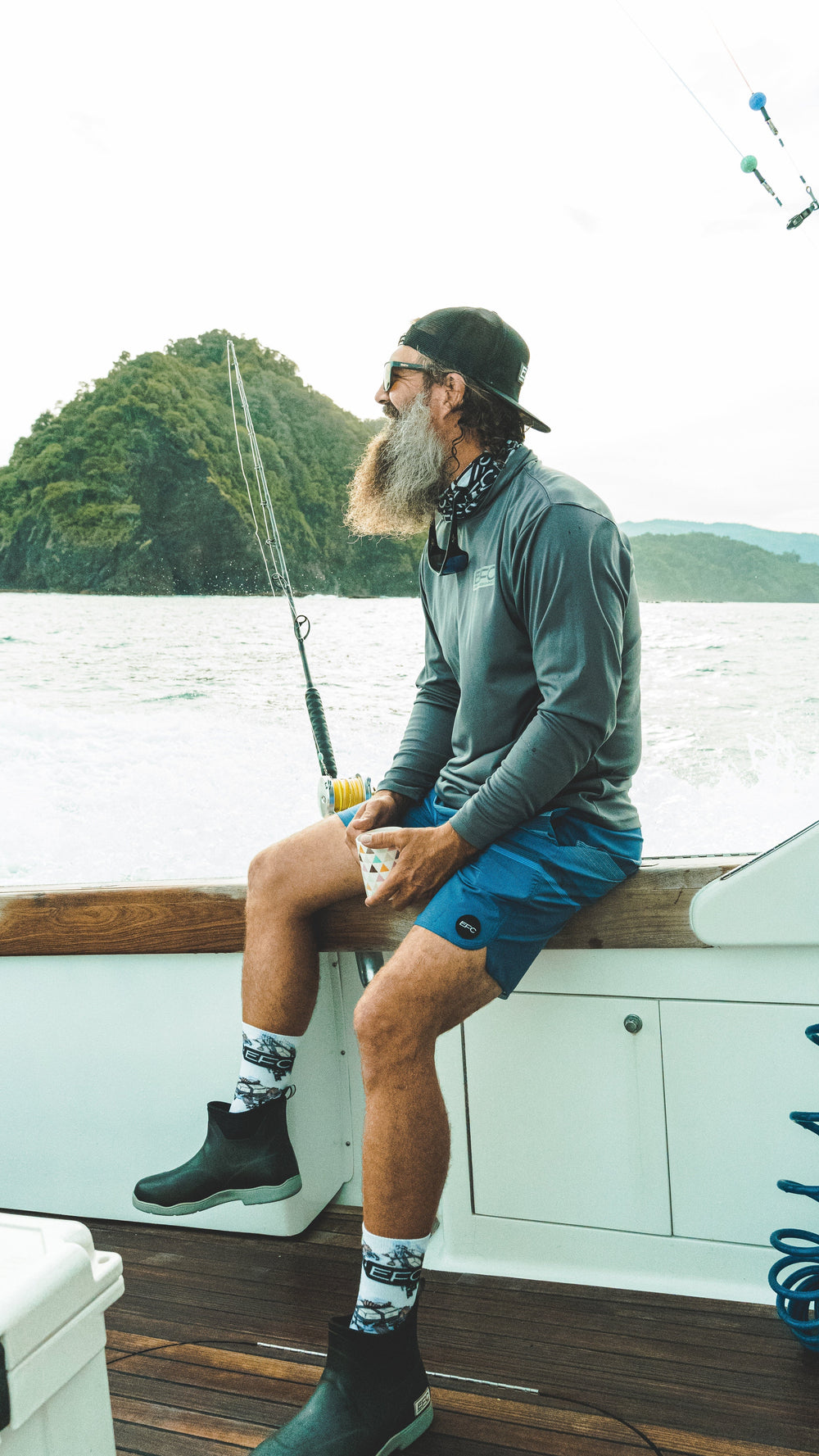 Square Grouper Socks by Everglades Fishing Co featuring a fish design and vibrant colors, perfect for fishing enthusiasts.