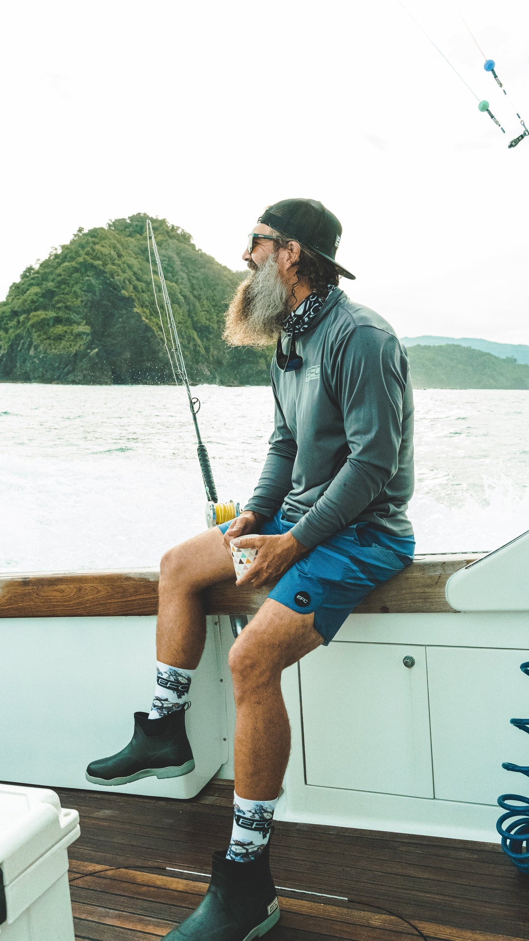 Square Grouper Socks by Everglades Fishing Co featuring a fish design and vibrant colors, perfect for fishing enthusiasts.