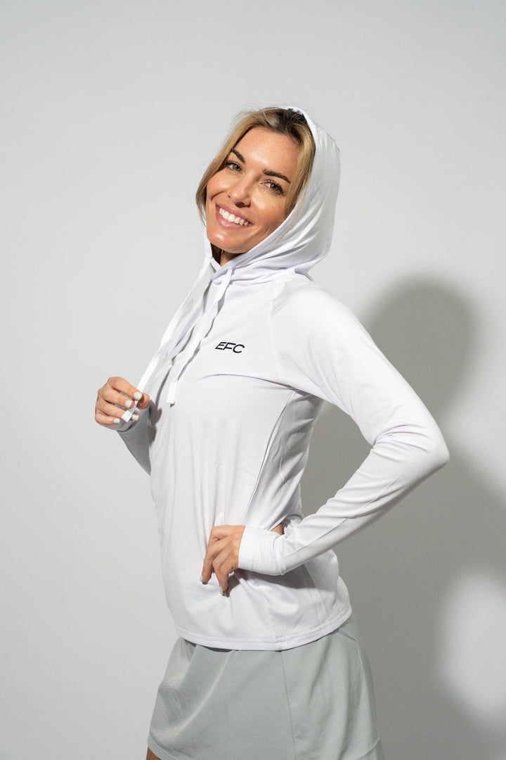 White women's performance hood shirt by Everglades Fishing Co, featuring a comfortable fit and lightweight fabric for outdoor activities.