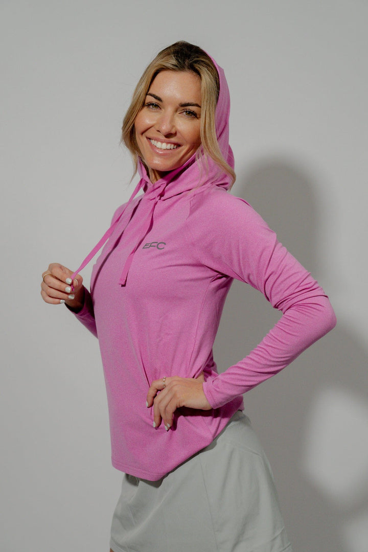Pink women's performance hooded shirt by Everglades Fishing Co, showing the lightweight fabric and hood design.