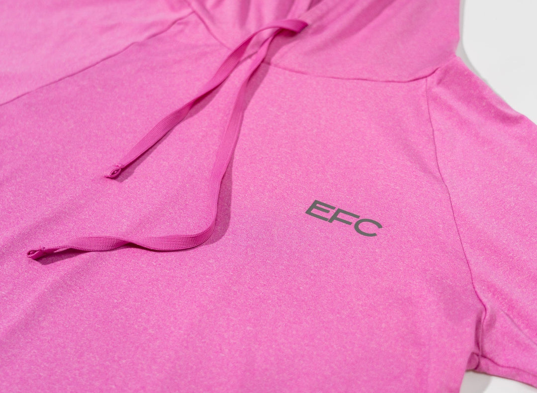 Pink women's performance hood shirt by Everglades Fishing Co, featuring lightweight fabric and a comfortable fit.