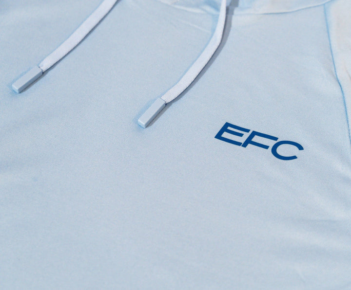 Blue Sync Women's Performance Hoodie shirt by Everglades Fishing Co, featuring lightweight, moisture-wicking fabric and a comfortable fit.