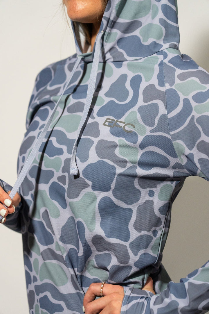 Tracker Women's Performance Hood shirt by Everglades Fishing Co, featuring a lightweight, moisture-wicking fabric and hood design.