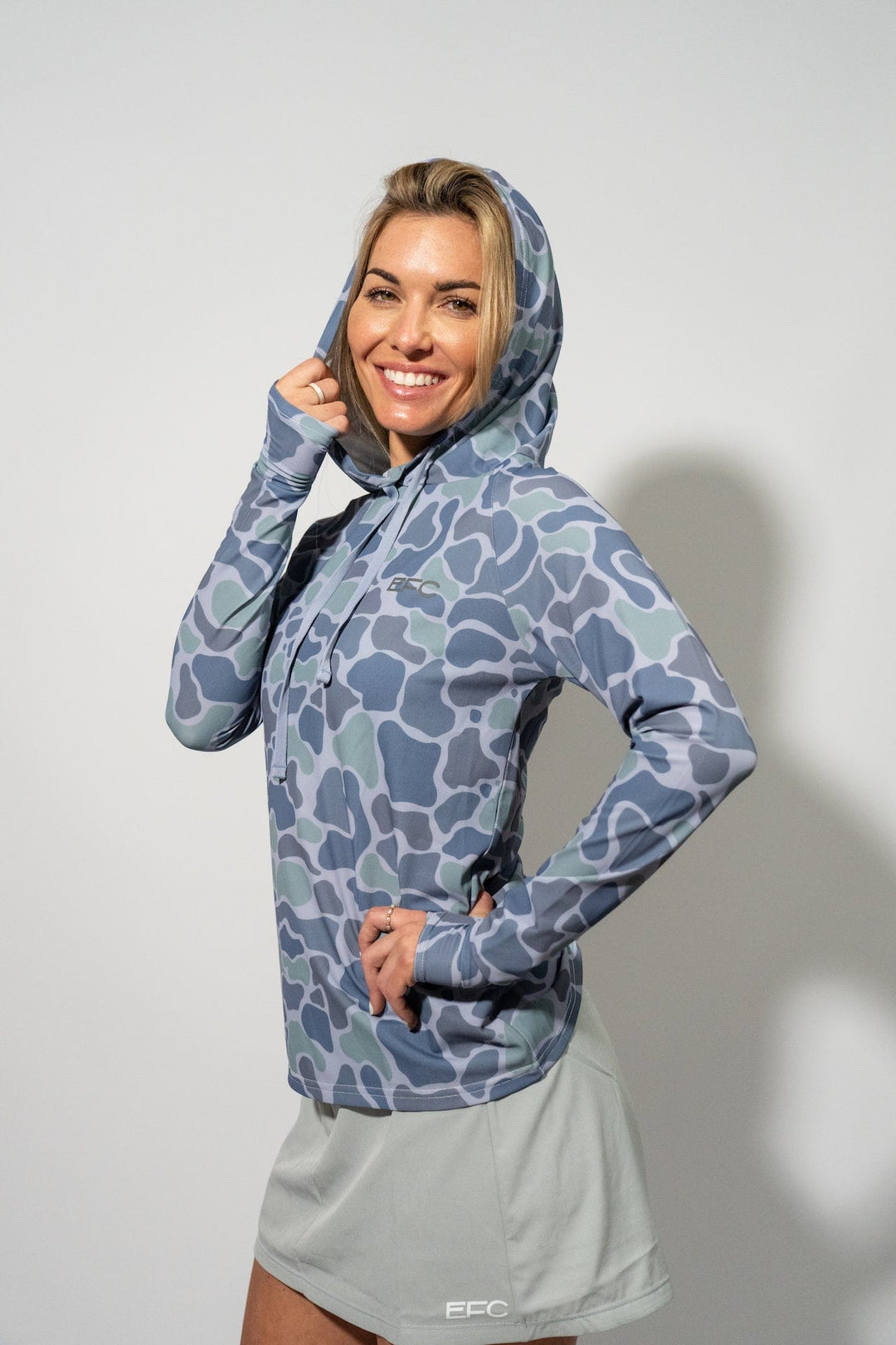 Tracker Women’s Performance Hood shirt by Everglades Fishing Co, featuring lightweight, moisture-wicking fabric and hood for outdoor activities.