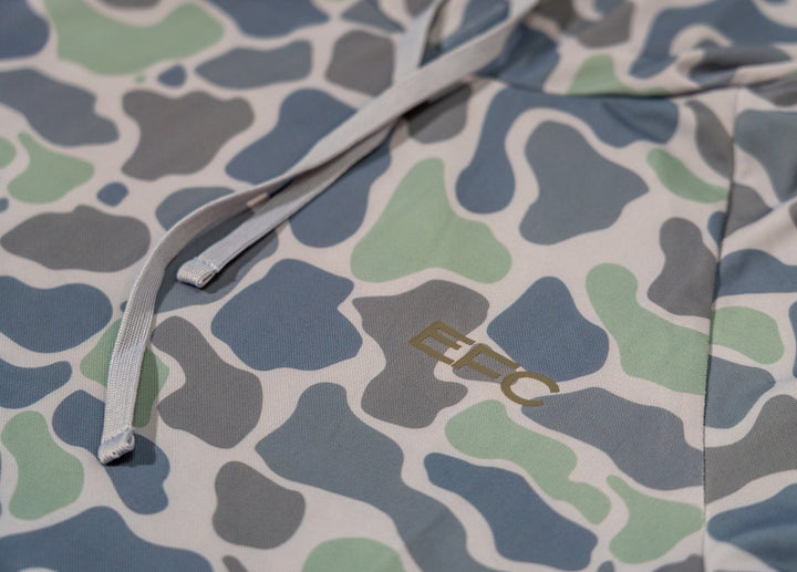 Tracker Women's Performance Hood shirt by Everglades Fishing Co, featuring lightweight fabric and a comfortable fit for active wear.