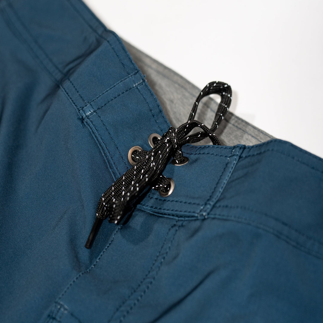 Everglades Fishing Co Element Navy boardshorts with adjustable waistband and lightweight fabric, displayed flat on a white background.