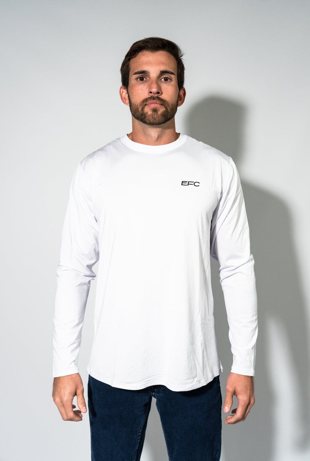 Everglades Fishing Co OG White Performance Shirt displayed on a hanger, showcasing lightweight, moisture-wicking fabric and classic fit.