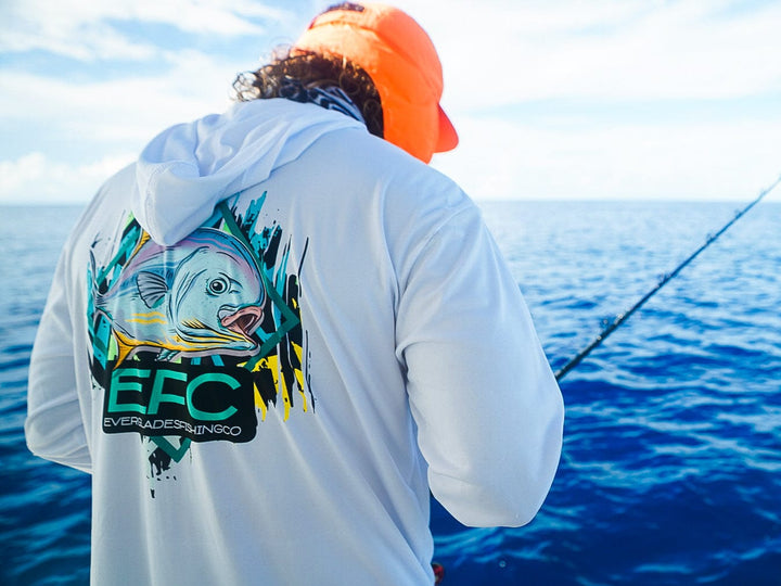 Everglades Fishing Co Permit teal and white hooded performance shirt with lightweight fabric and fishing-inspired design.