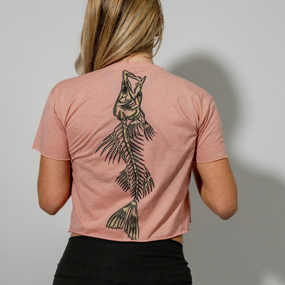 Everglades Fishing Co Snook Bones crop top in desert pink, featuring a stylish, lightweight design with fish-themed graphic.