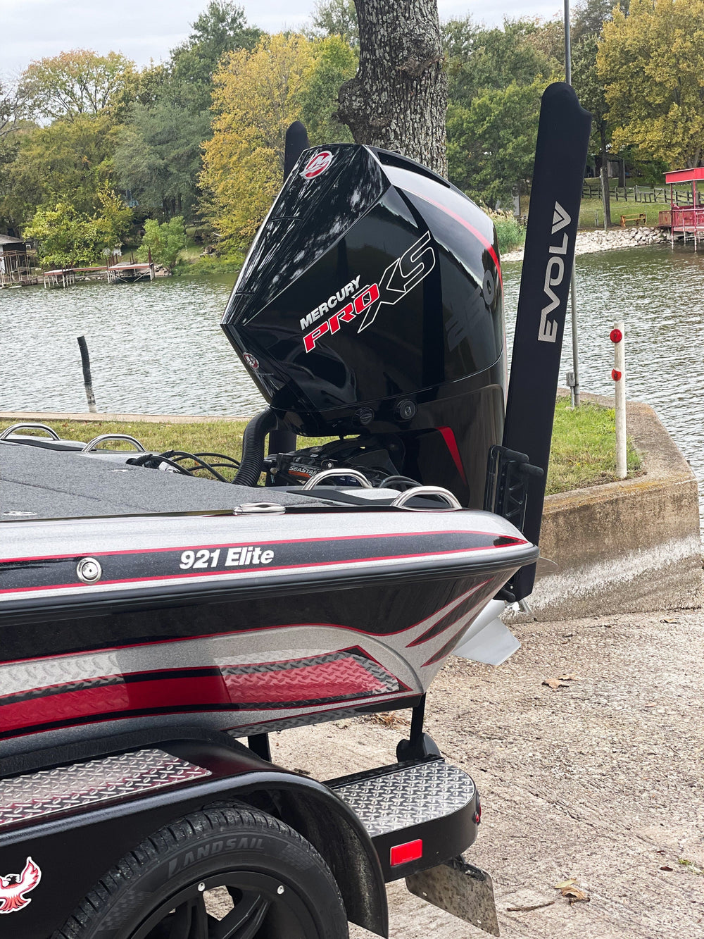Pair of EVOLV Fishing neoprene power pole travel covers protecting fishing poles during transport.