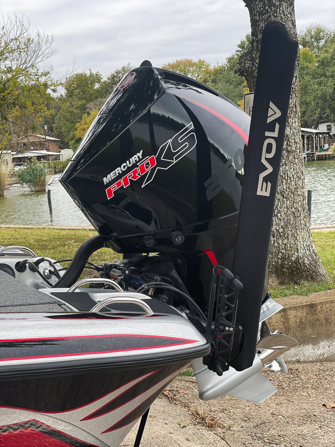 Pair of EVOLV Fishing Neoprene Power Pole Travel Covers, designed to protect fishing poles during travel.