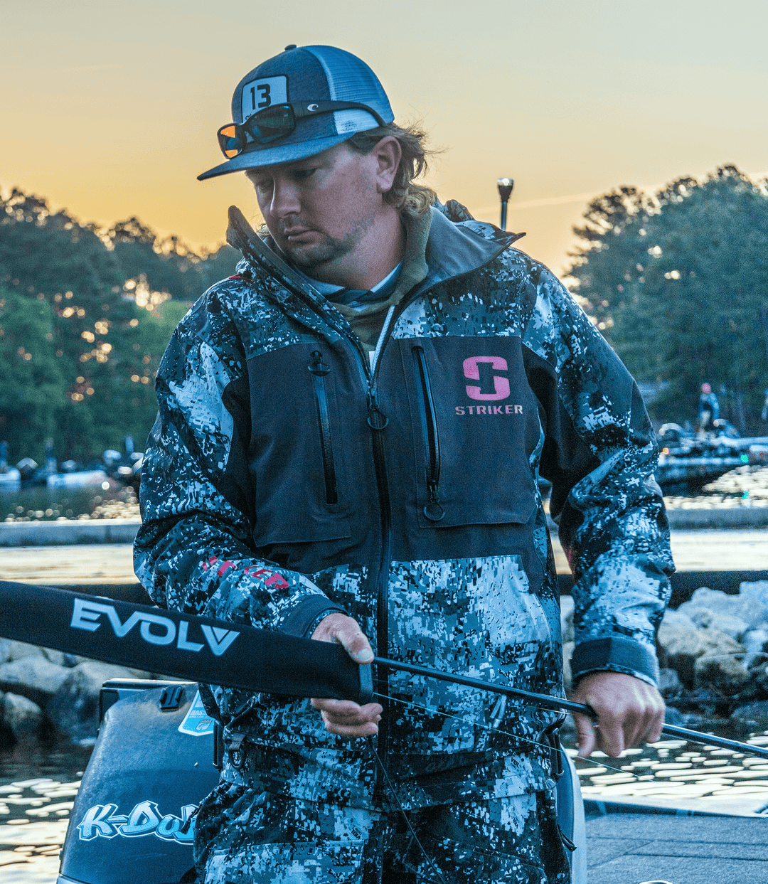 Red EVOLV Fishing Tournament Edition spinning rod sleeves with shorty design and standard collar for secure protection.