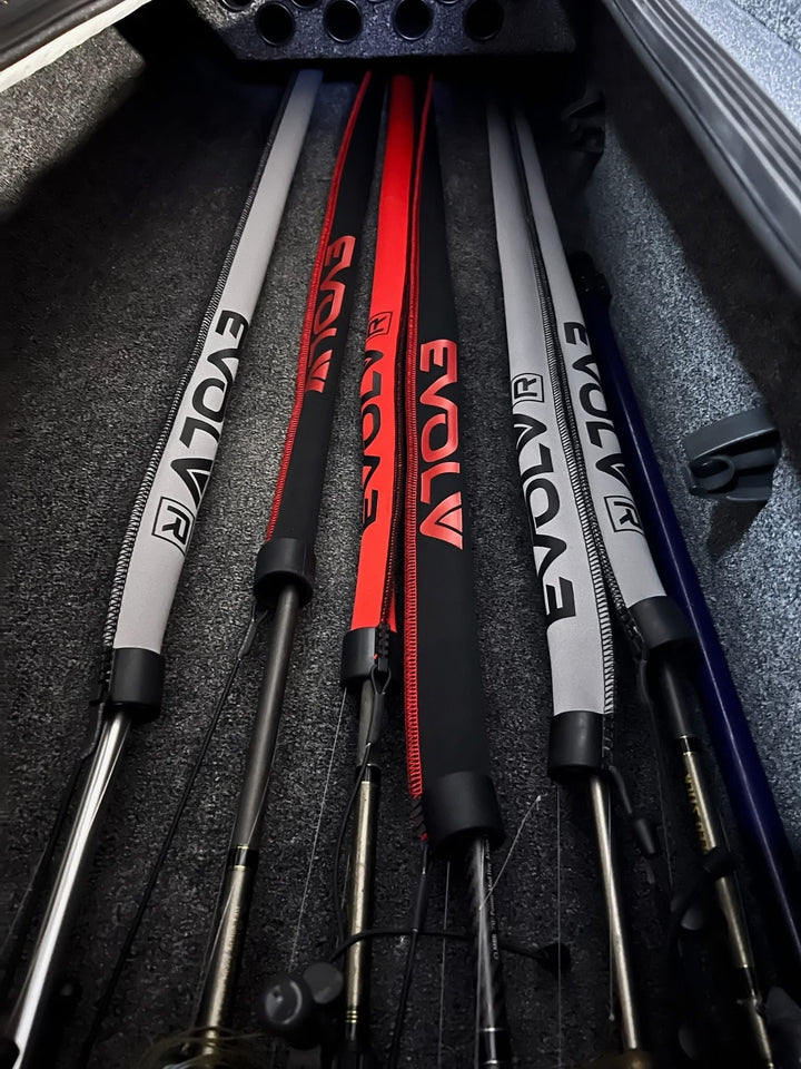 Red Tournament Edition baitcast rod sleeves by EVOLV Fishing, designed to protect and store fishing rods.