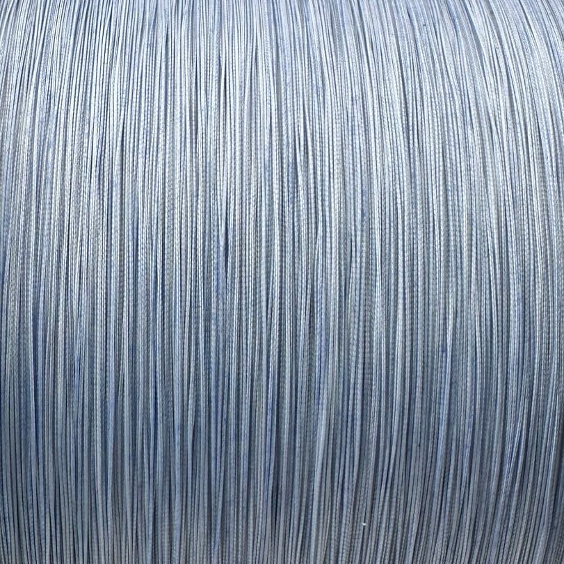 Blue 40G FINS Braids fishing line, 65-100 lb. strength, close-up of the braided nylon fishing line on a spool.