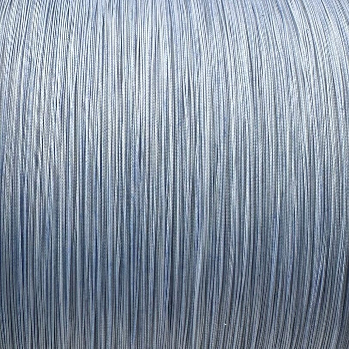 Blue 40G FINS Braids fishing line, 65-100 lb. strength, close-up of the braided nylon fishing line on a spool.