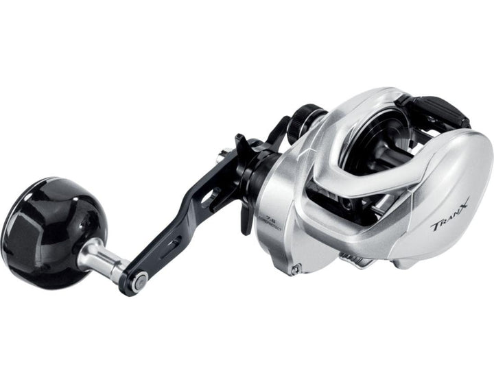 Shimano Tranx baitcasting reel, model TRX150HGA, with ergonomic handle and spool, suitable for freshwater and saltwater fishing.