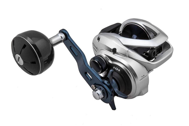 Shimano Tranx baitcasting reel, black fishing reel with metal handle and line spool, designed for durable saltwater fishing.