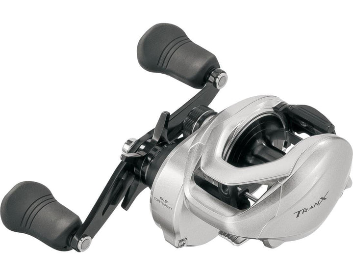Shimano Tranx baitcasting reel for fishing, featuring durable construction and smooth operation, shown in close-up.