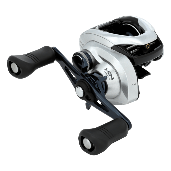Shimano Tranx baitcasting reel with metal frame and ergonomic handle, designed for smooth casting and retrieval.