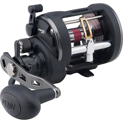 Penn Warfare conventional reel with levelwind, featuring a sturdy metal body and ergonomic handle for saltwater fishing.