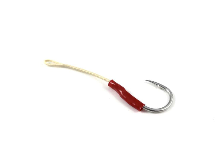 Fisherman's Headquarters Owner Dancing Stinger Assist Hooks displayed on a fishing rod for enhancing lure presentation and bite detection.