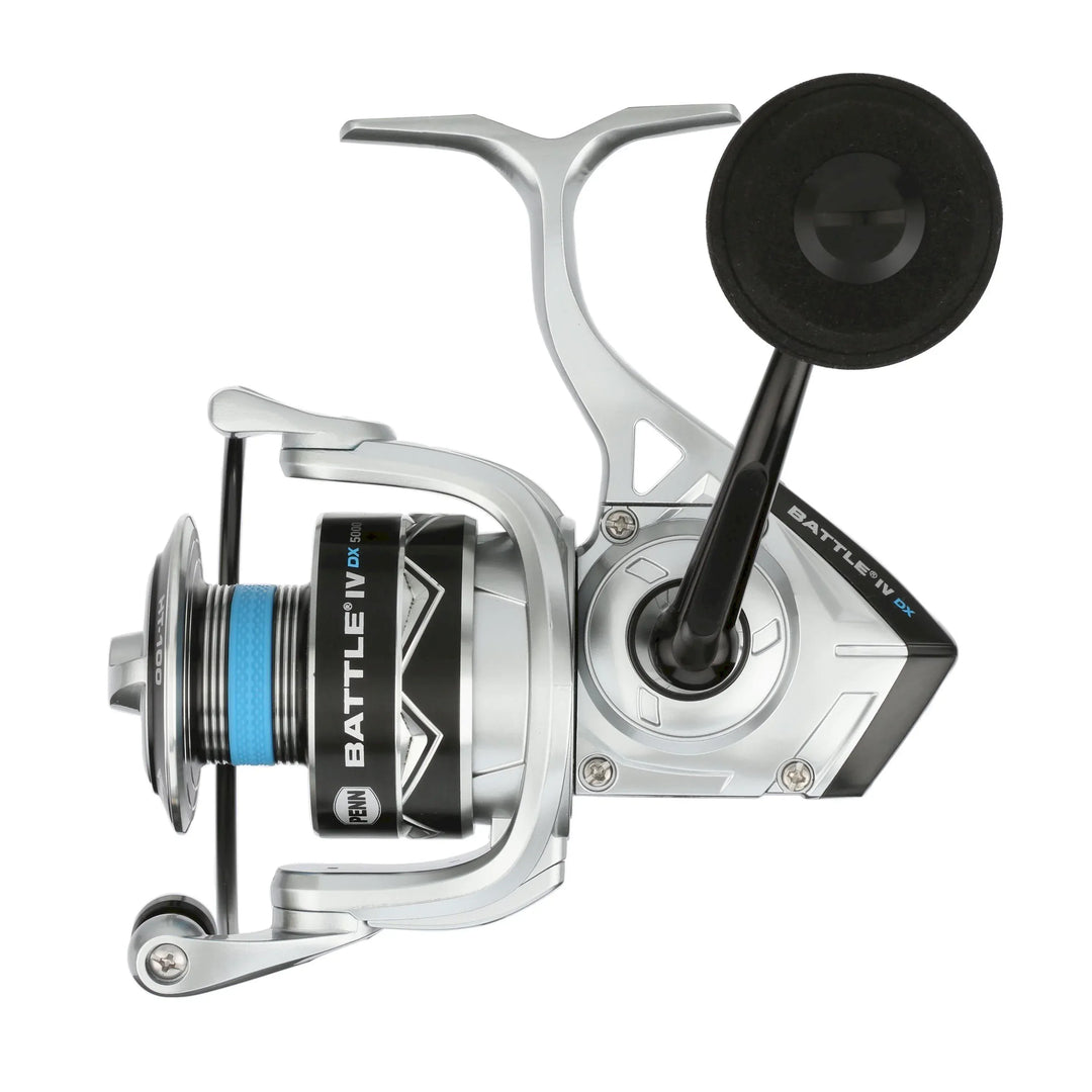Fisherman's Headquarters Penn Battle IV DX spinning reel mounted on fishing rod, close-up view showing reel handle and spool.
