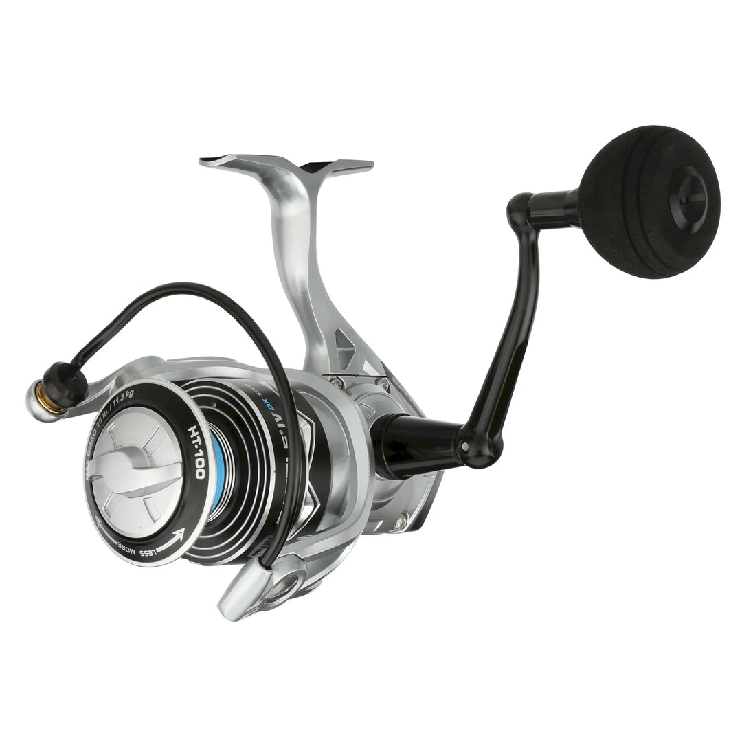 Penn Battle IV DX spinning reel with black and silver finish, mounted on fishing rod, showcasing handle and spool details.
