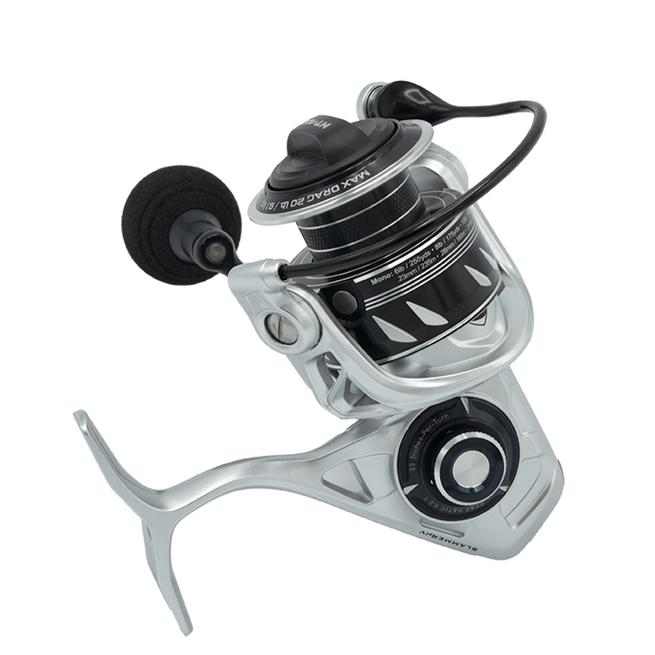 Fisherman's Headquarters Penn Slammer IV DX spinning reel with black body and metal spool, ready for fishing.