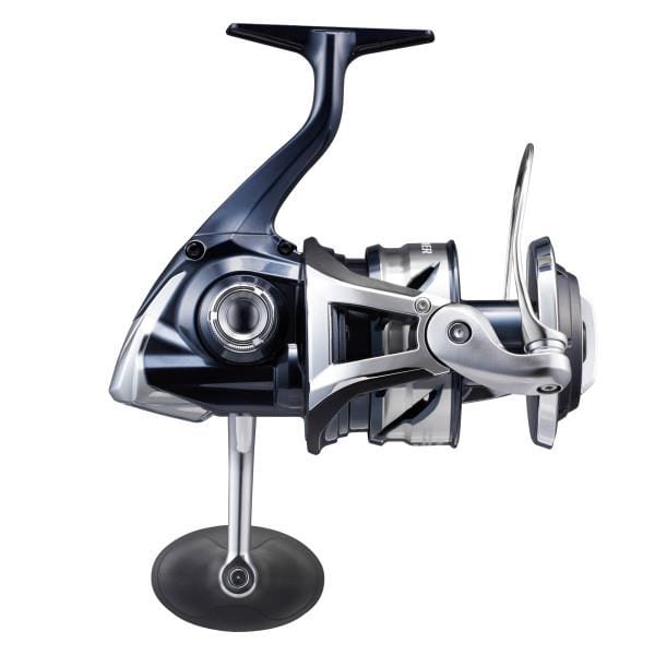 Shimano Twin Power SW spinning reel in black with silver accents, designed for saltwater fishing, shown mounted on a fishing rod.