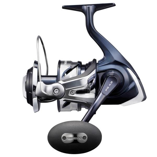 Shimano Twin Power SW spinning reel in black with silver accents, shown with handle and line spool for saltwater fishing.