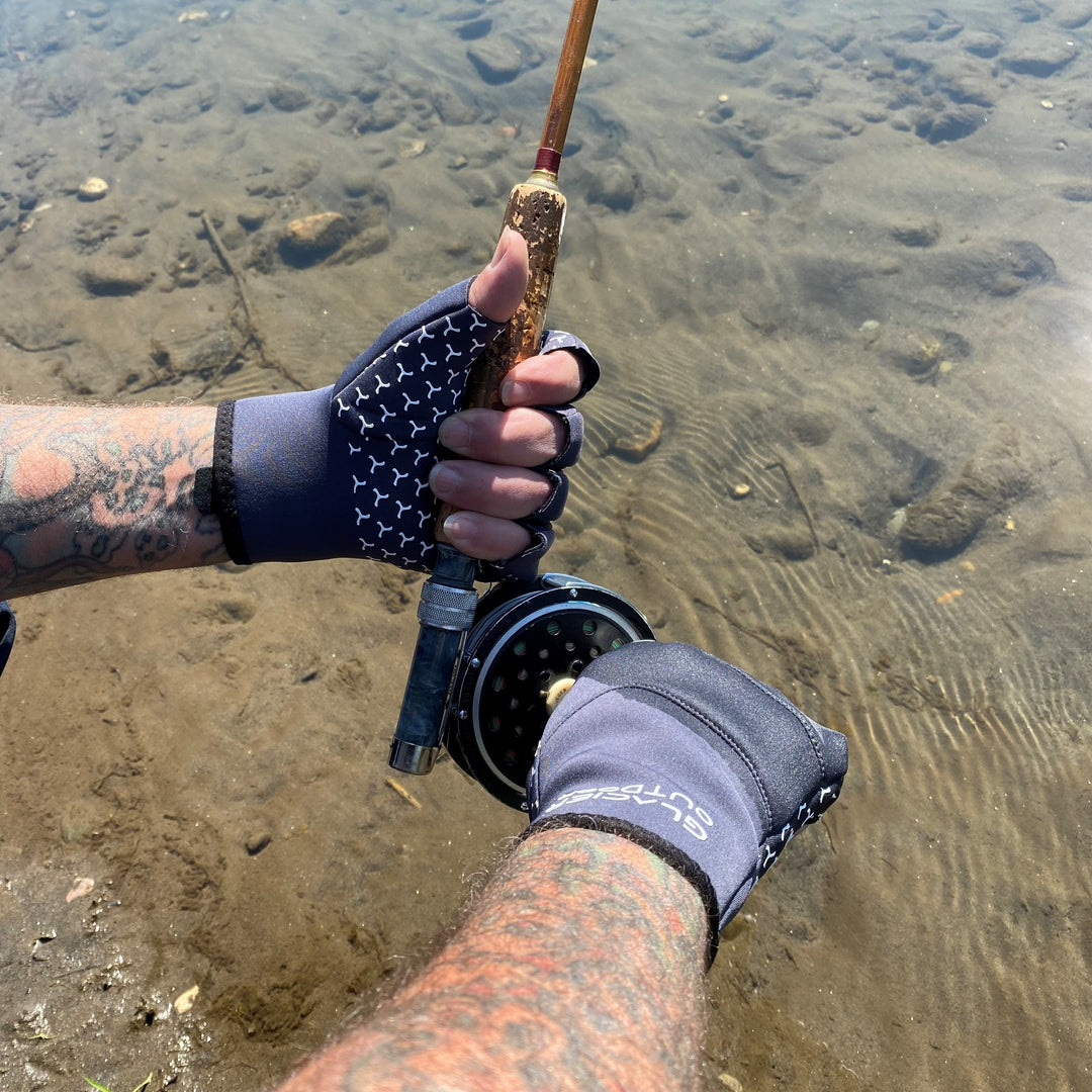 Black Cold River™ Fingerless Glove by Glacier Outdoor, showing close-up of textured fabric and fingerless design for outdoor activities.