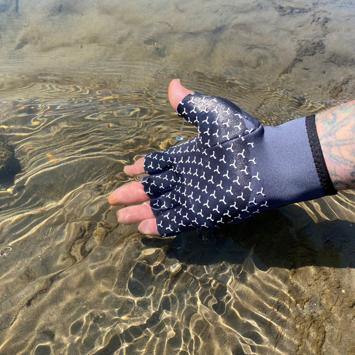 Cold River™ fingerless gloves by Glacier Outdoor, showcasing black insulated gloves with textured palm grip for outdoor activities.
