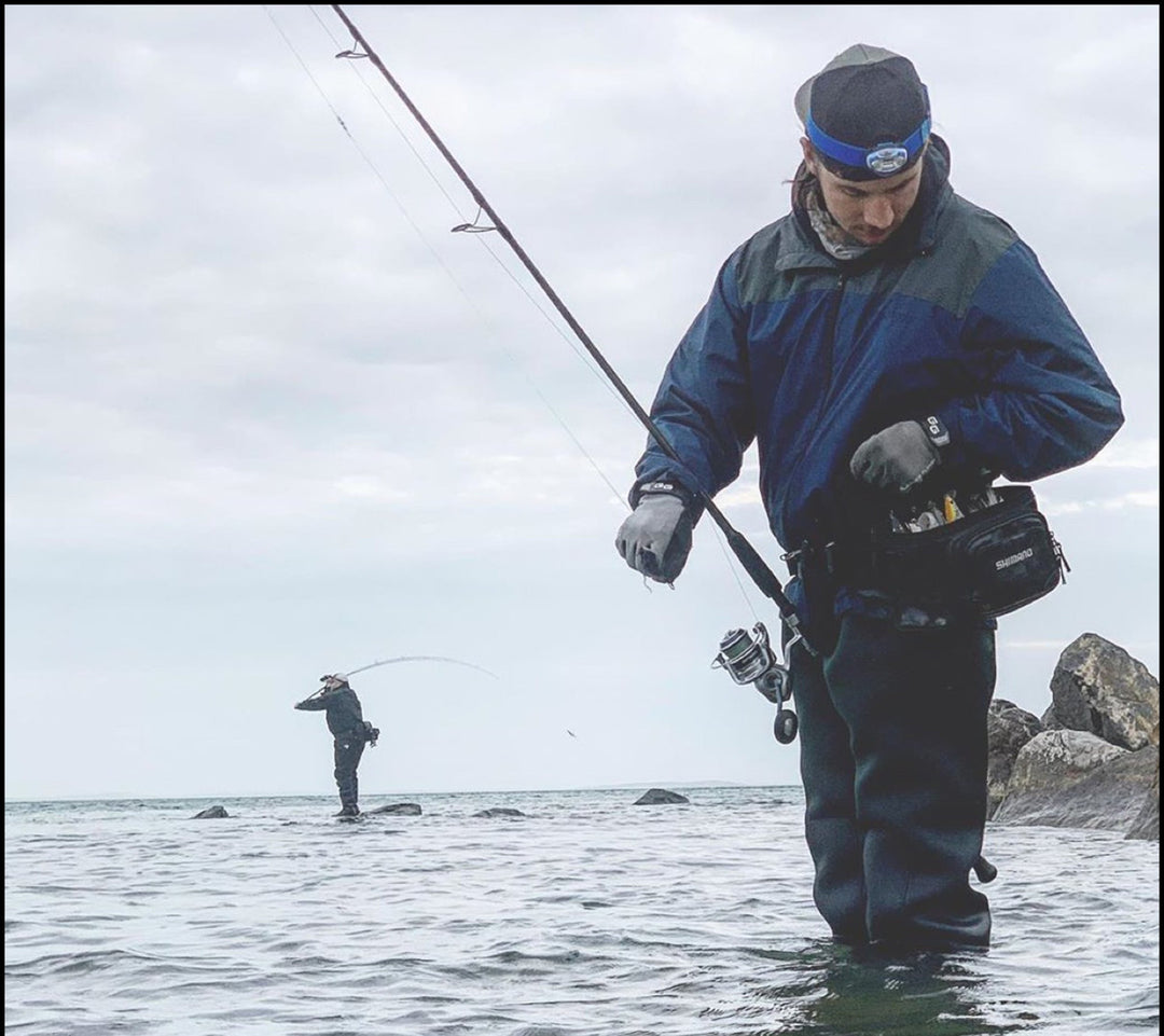 Glacier Outdoor Elite Angler gloves with textured grip, waterproof design, and insulated material for fishing in cold weather.