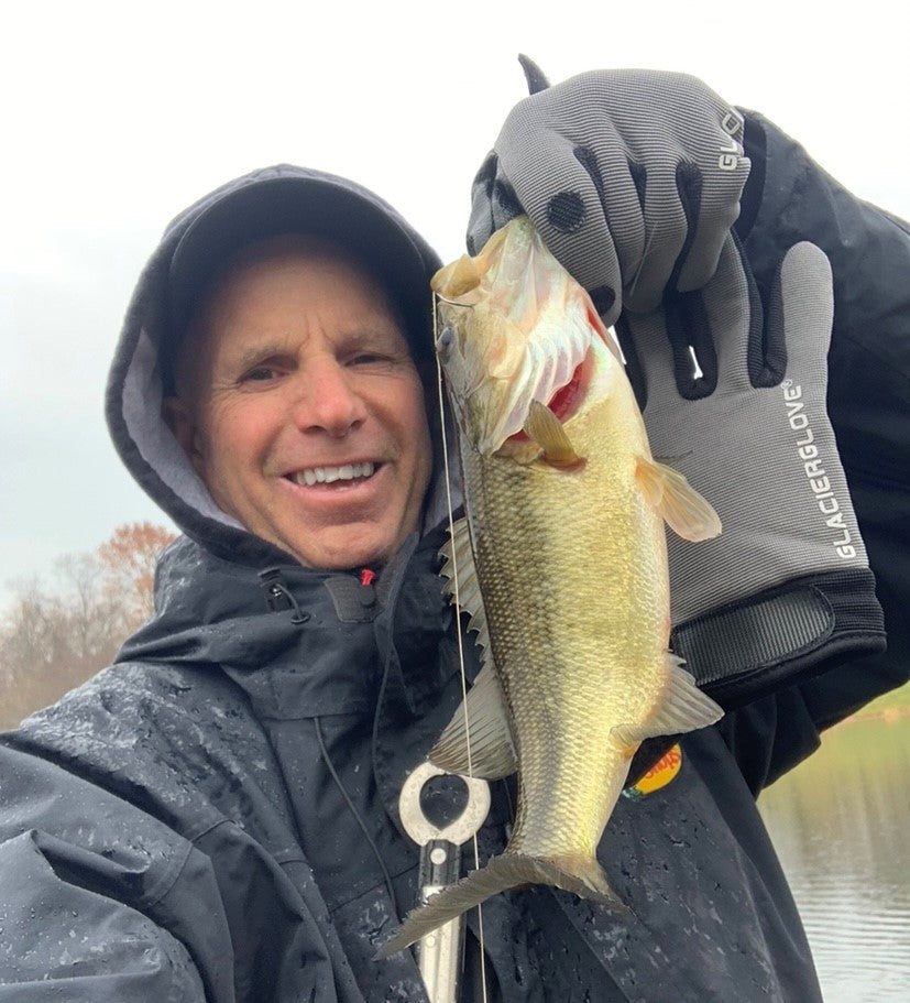 Glacier Outdoor Elite Angler gloves, black waterproof fishing mittens with adjustable straps, designed for outdoor fishing activities.