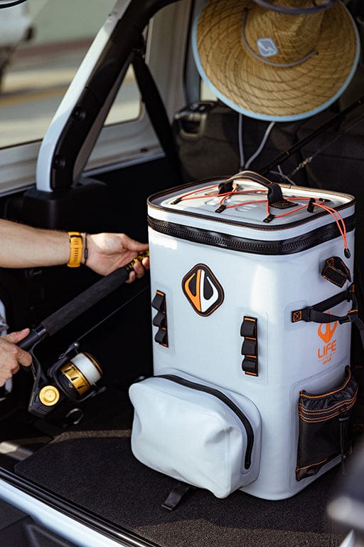 Large outdoor cooler backpack by Life League Gear with insulated compartments, adjustable straps, and a durable design for outdoor use.
