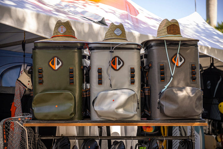 Large outdoor cooler backpack by Life League Gear, featuring insulated compartments and adjustable straps for outdoor activities.